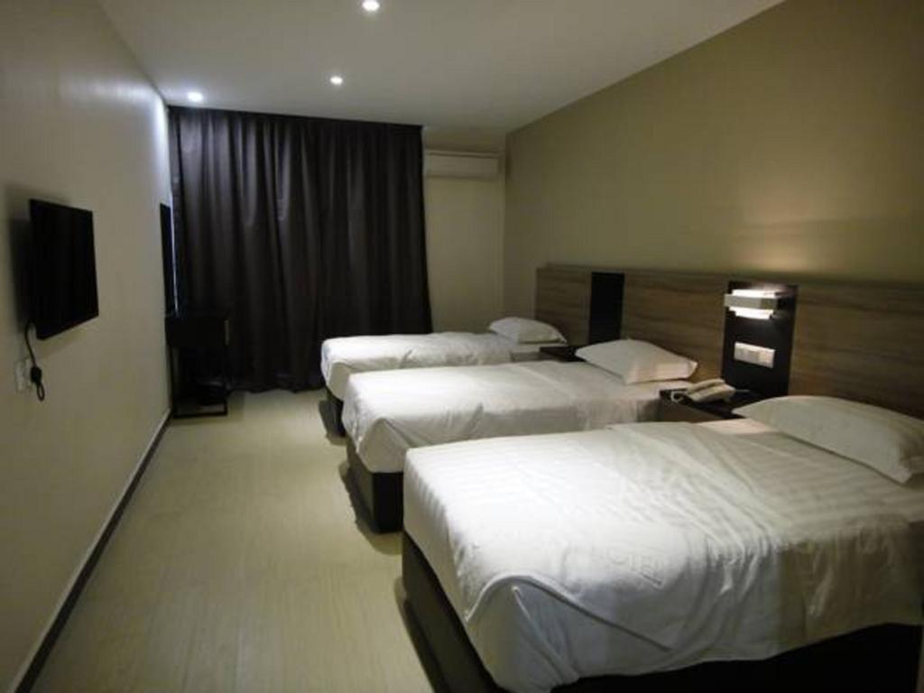 Galaxy Hotel Simpang Ampat  Chambre photo